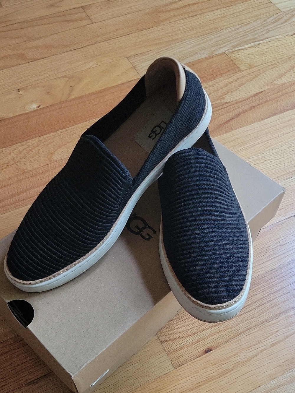 UGG Men's Black Ribbed Slip-On Sneakers with White Sole